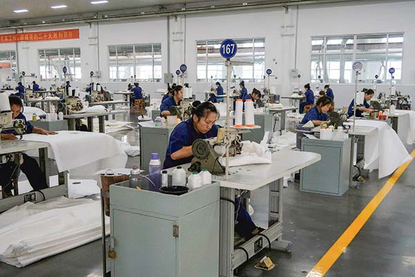 Economía china se estabiliza y la actividad fabril vuelve a crecer